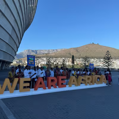 we are africa entrance with mountain in background