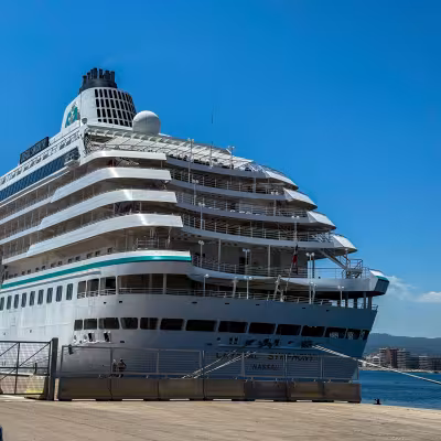 crystal symphony at port with blue sky
