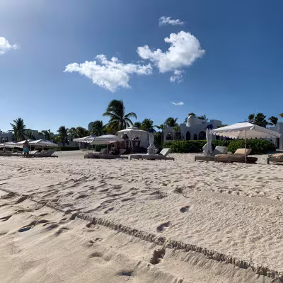 footprints in uncrowded beach in anguilla