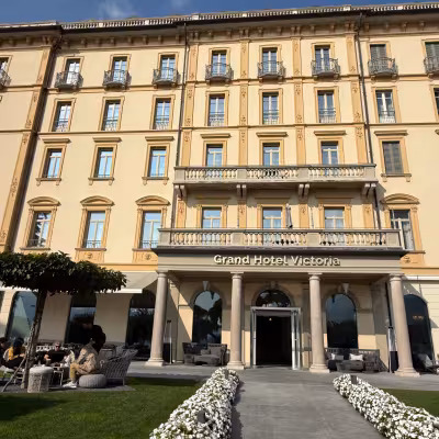 Grand Hotel Victoria entrance and historic façade in Menaggio on Lake Como, Italy