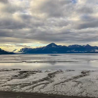 Mountain and tidal flat scenery along the scenic Anchorage-to-Seward train ride, Alaska