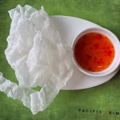 Crispy shrimp chip appetizer with sweet chili dipping sauce at Pacific Rim restaurant on Regent Seven Seas Explorer