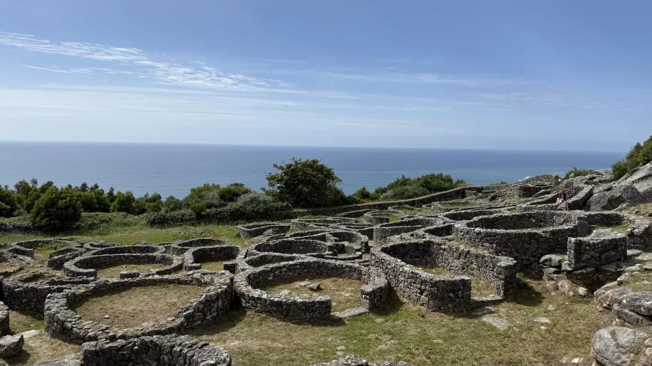 Pre‑Roman hillfort ruins at Santa Tecla overlooking Atlantic Ocean near A Guarda